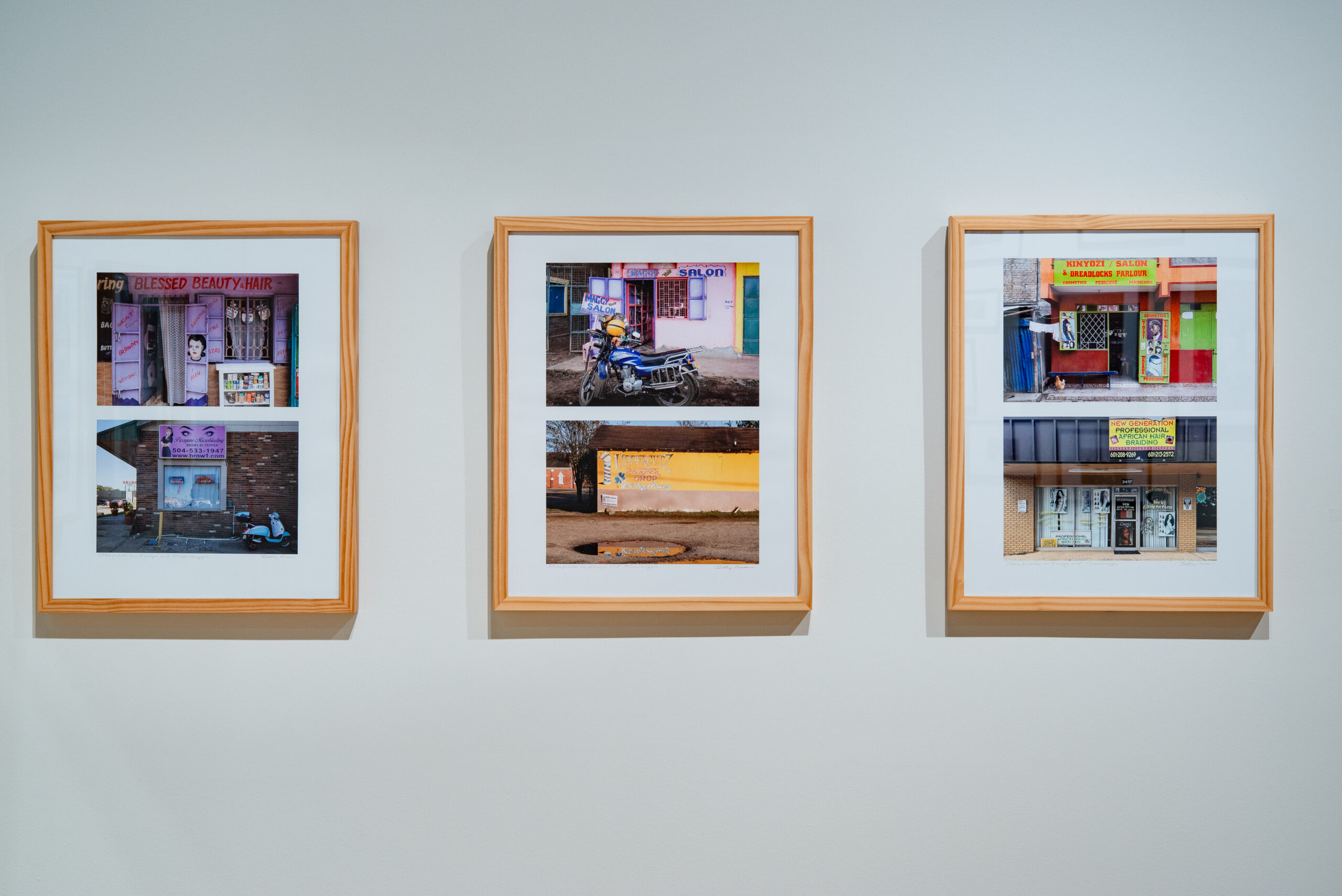 Betty Press (born 1942), Storefronts in Kenya and Mississippi, 2001-03; Installation view; Archival pigment prints