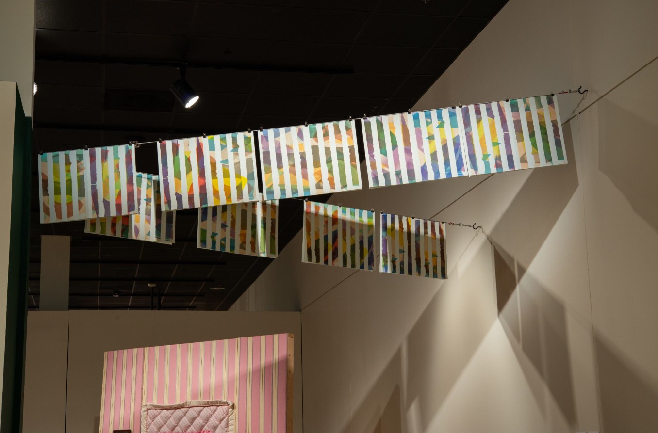 Connor Frew (born 1995), Poem for Daniel Buren (Flags), 2024; Installation view; 18 twelve-color risograph prints on paper, steel cable, binder clips