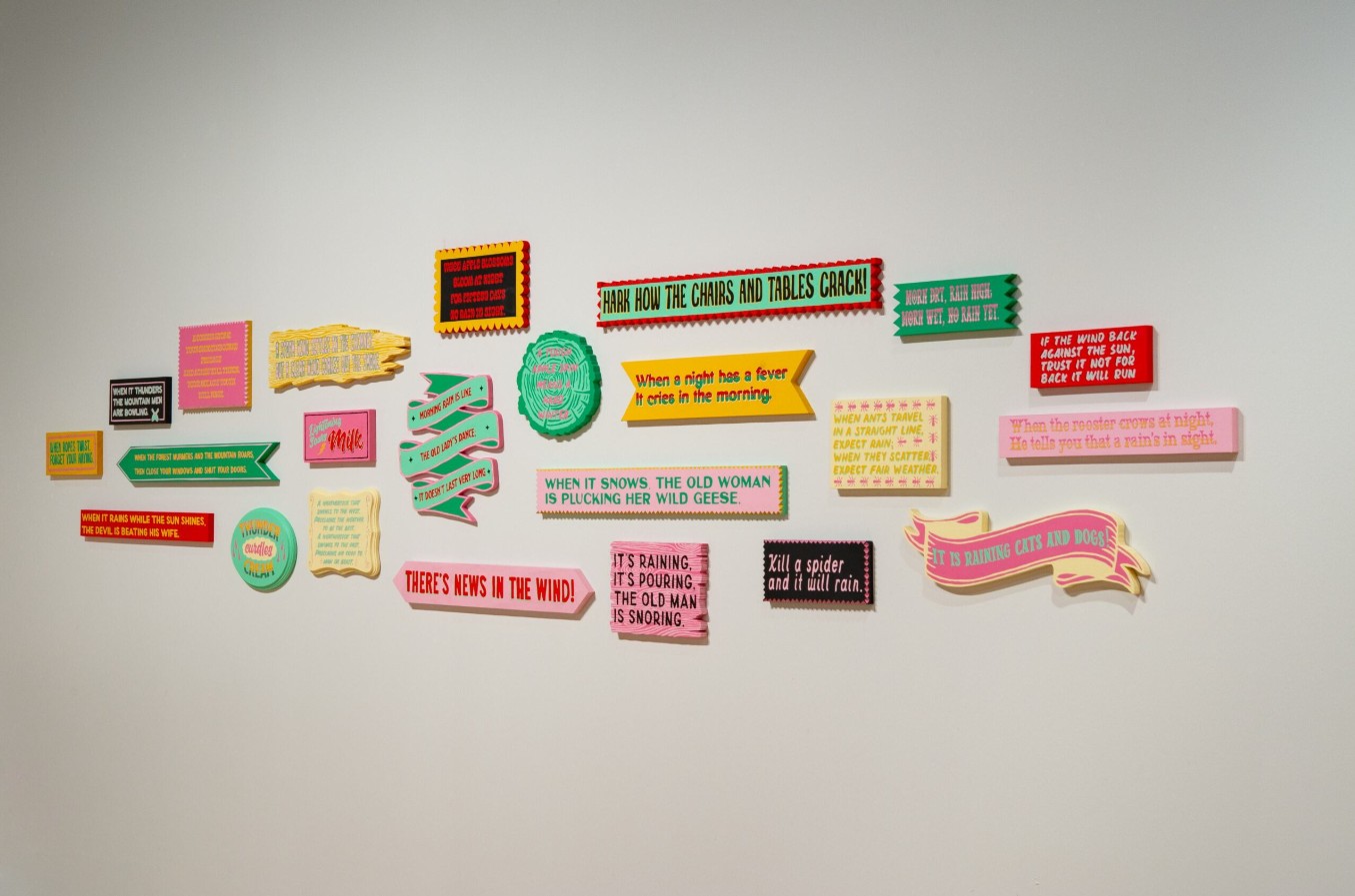 Kaleena Stasiak (born 1986), Words of Warning, 2024–ongoing; Installation view; House paint on wooden boards