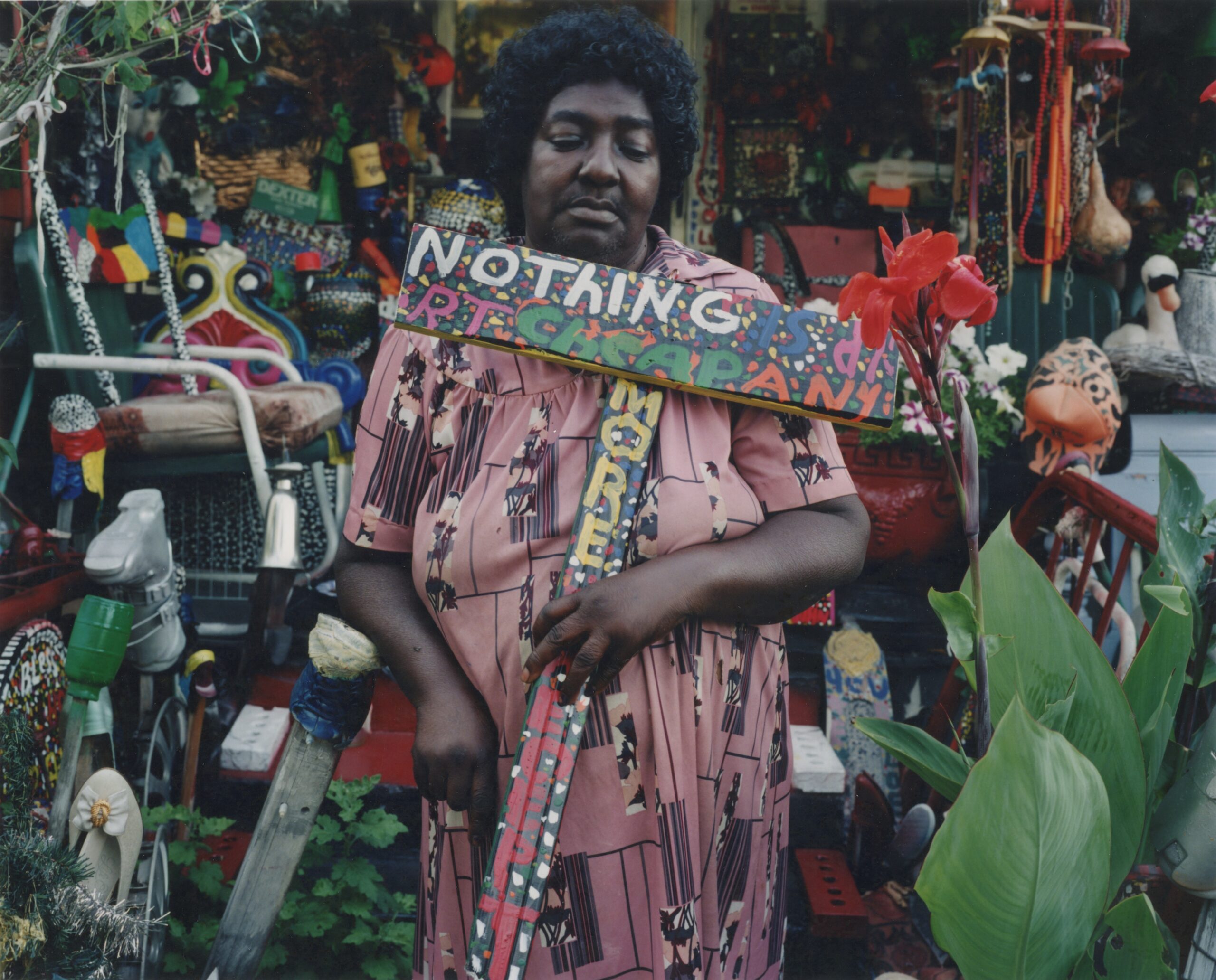 L.V. Hull surrounded by her art environment and garden in Kosciusko, Mississippi in 2000. Photo: Bruce West. Collection of the Mississippi Museum of Art 