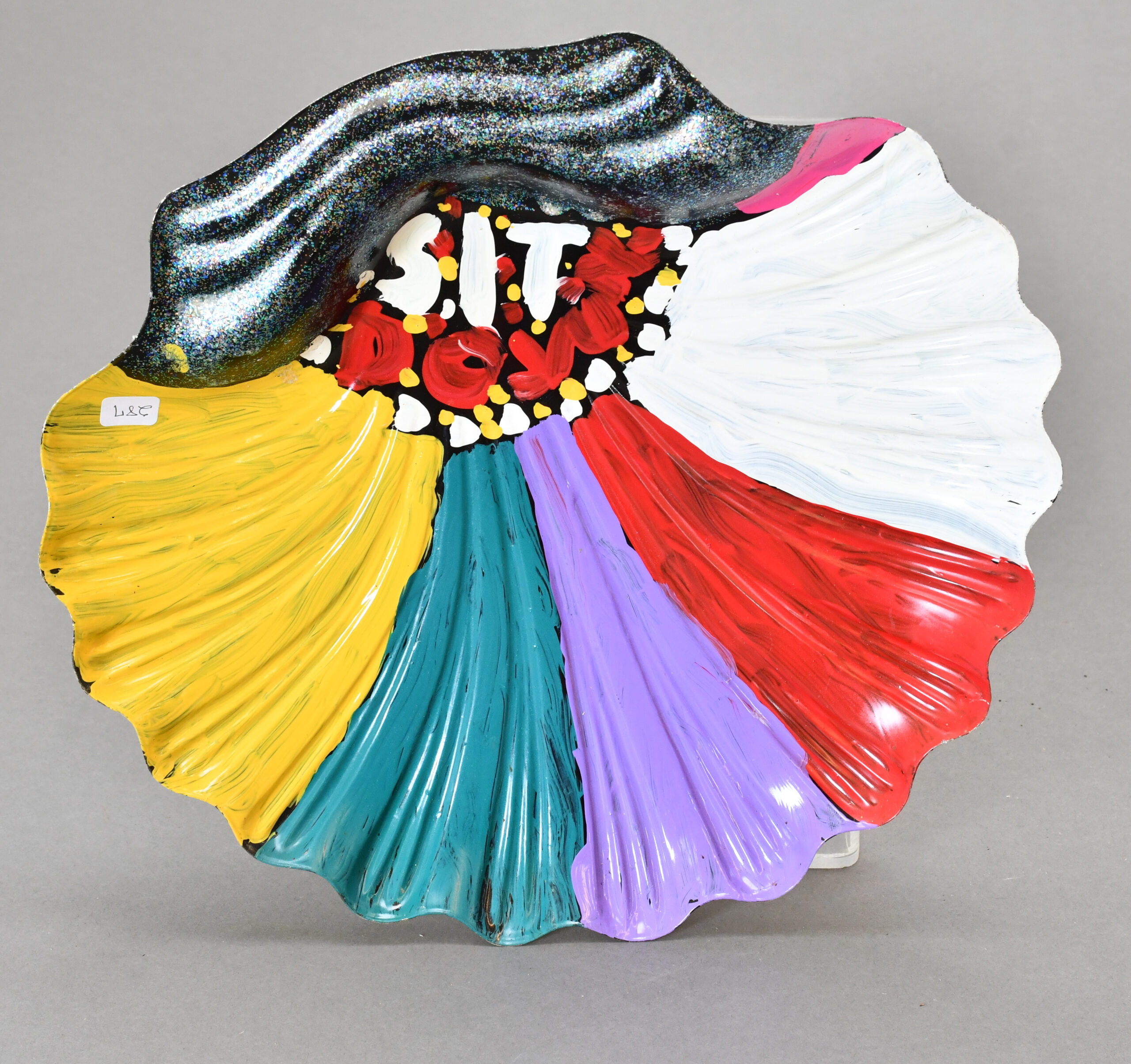 L.V. Hull (1942 – 2008), Untitled, 2004. Acrylic paint on plastic, 12.5 x 13.5 x 1.5 inches. Courtesy of the Estate of L.V. Hull, Arts Foundation of Kosciusko. Gift of Kohler Foundation, Inc.