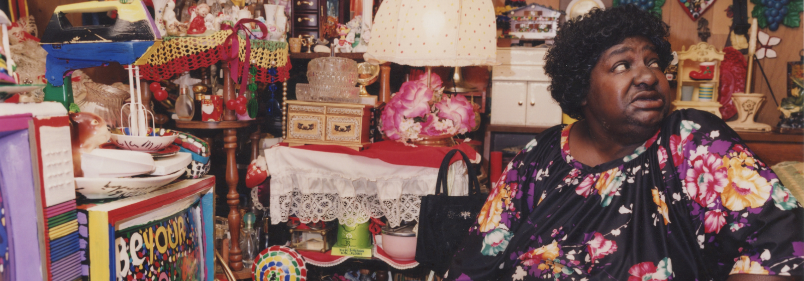 Mrs. L.V. Hull Looking at Gift for B.B. King in Her Bedroom. L.V. Hull on her bed in her Kosciusko, Mississippi, home in 2003. Photo: Bruce West